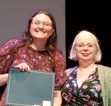 Student award winner with a faculty member