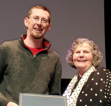 Student award winner with a faculty member